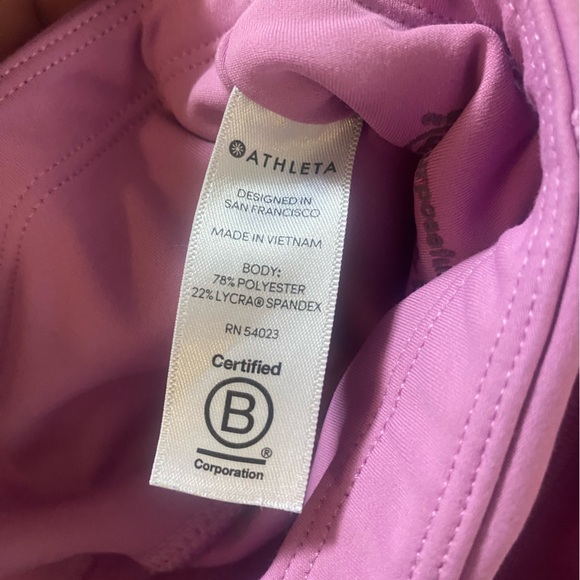 Athleta Women’s Size MP Purple Contender Laser Cut 7/8 Leggings with Zip Pockets - Picture 4 of 10